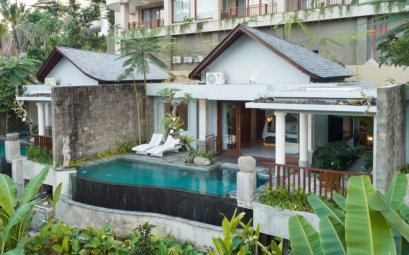 Luxury bedroom inside deluxe private pool villa in Ubud Bali with elegant decor