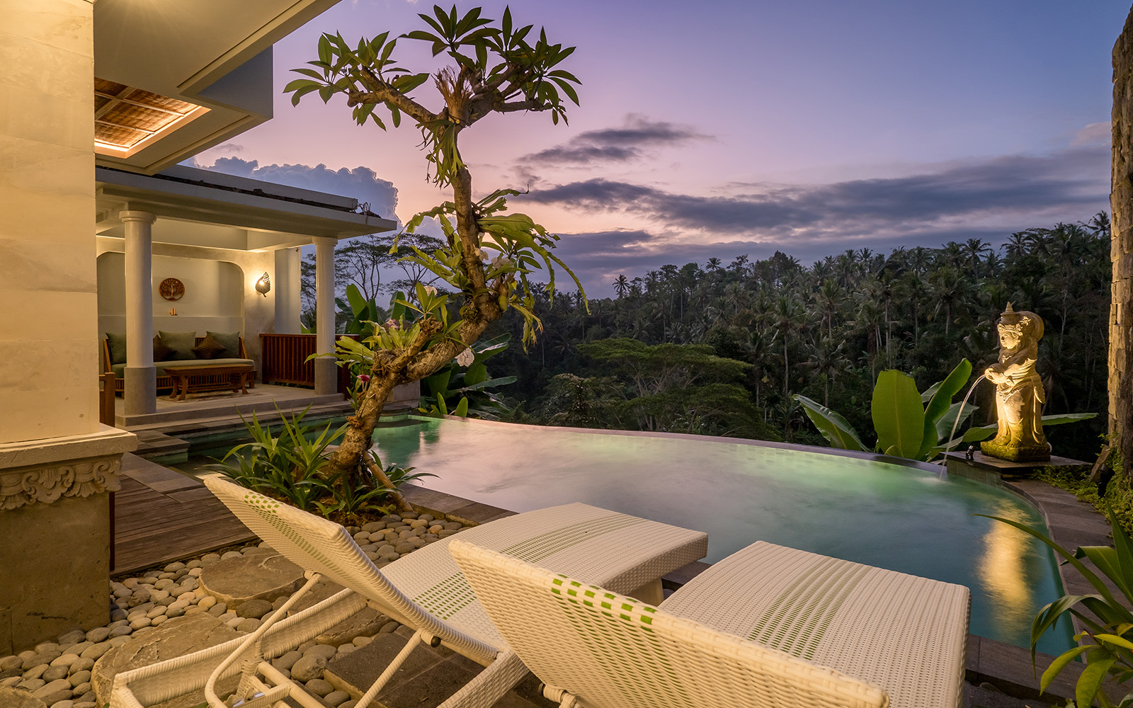Wide angle deluxe private pool villa showing relaxing tropical ambiance in Bali