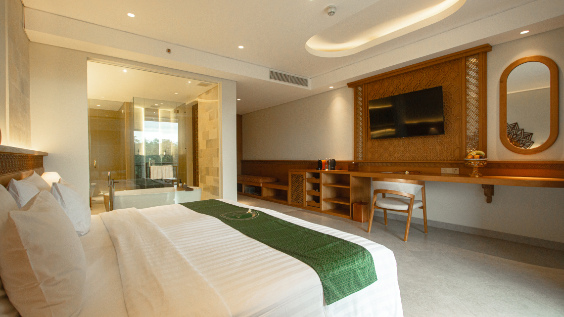 Wide angle deluxe suite room showing relaxing tropical ambiance in Bali