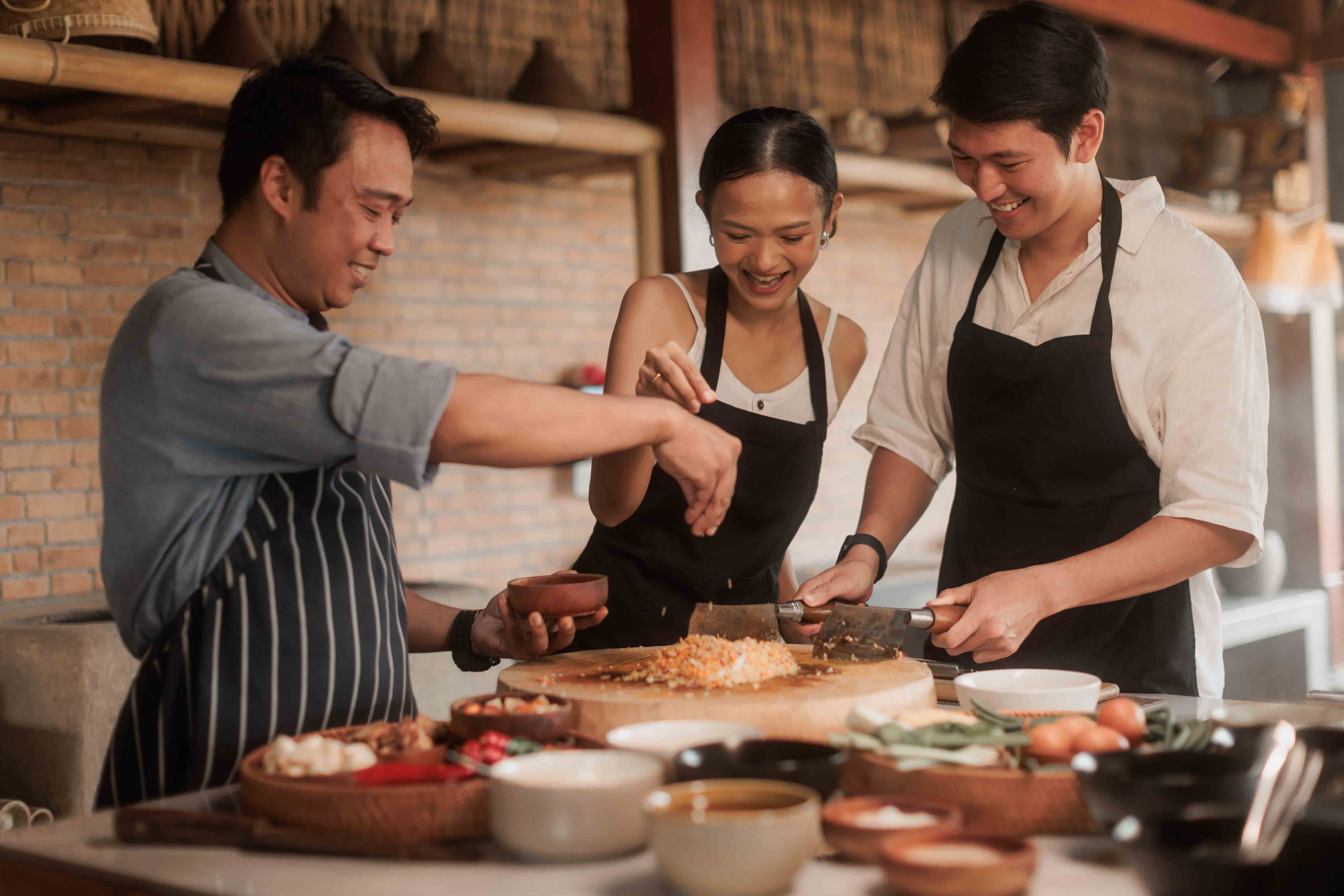 Balinese cooking class at Sanggraloka Ubud farm-to-table culinary experience using fresh organic ingredients from resort garden