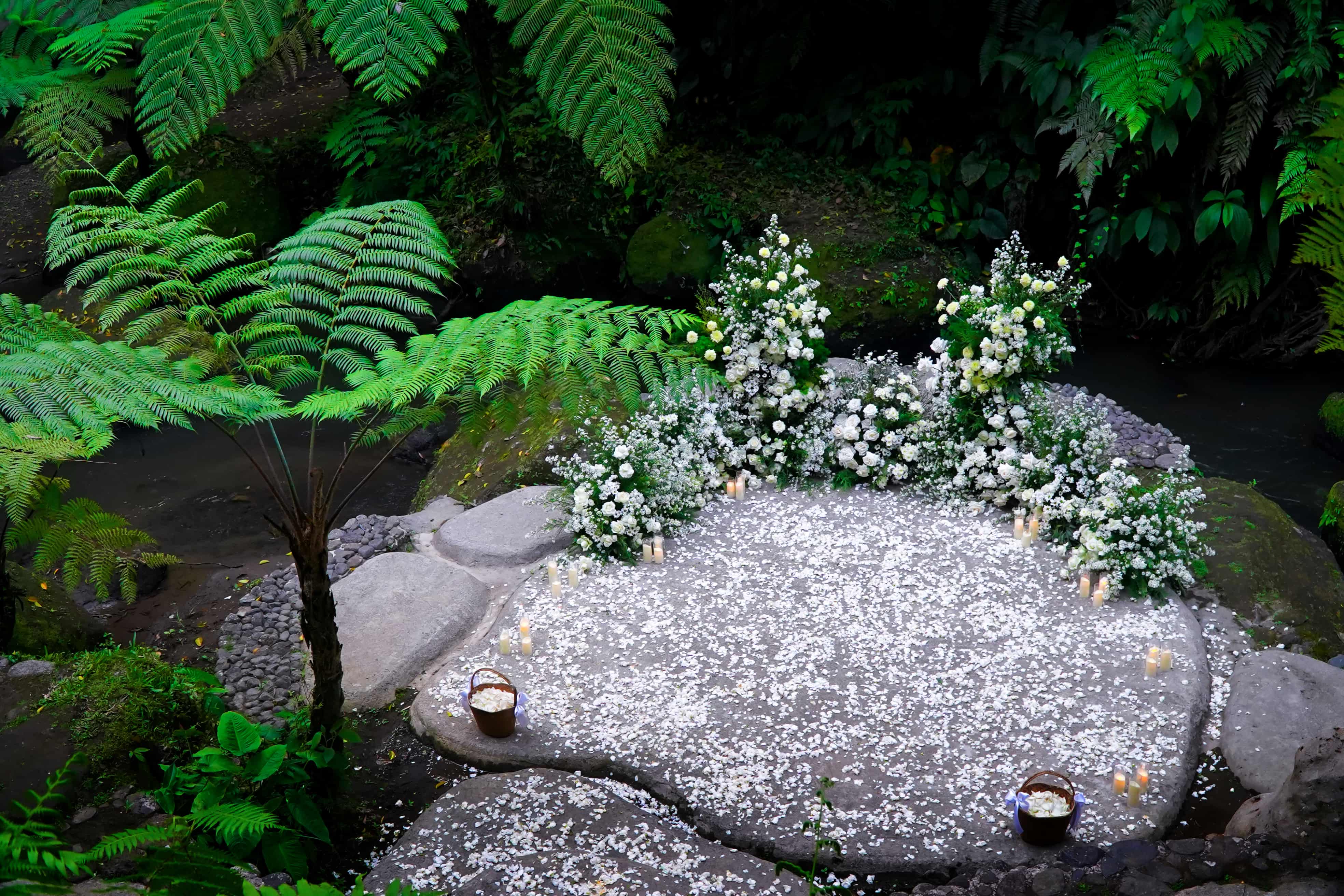 Renewal vows ceremony by a waterfall at Sanggraloka Ubud Bali
